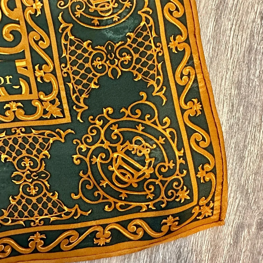 Vintage Dior silk scarf with hidden logo 35x35”rolled hem. Tag on side.